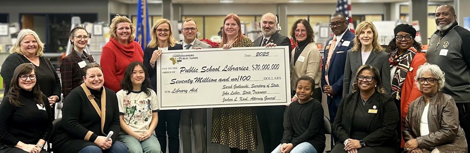 Ceremonail check of $70 million dollars presented to WEMTA representatives.