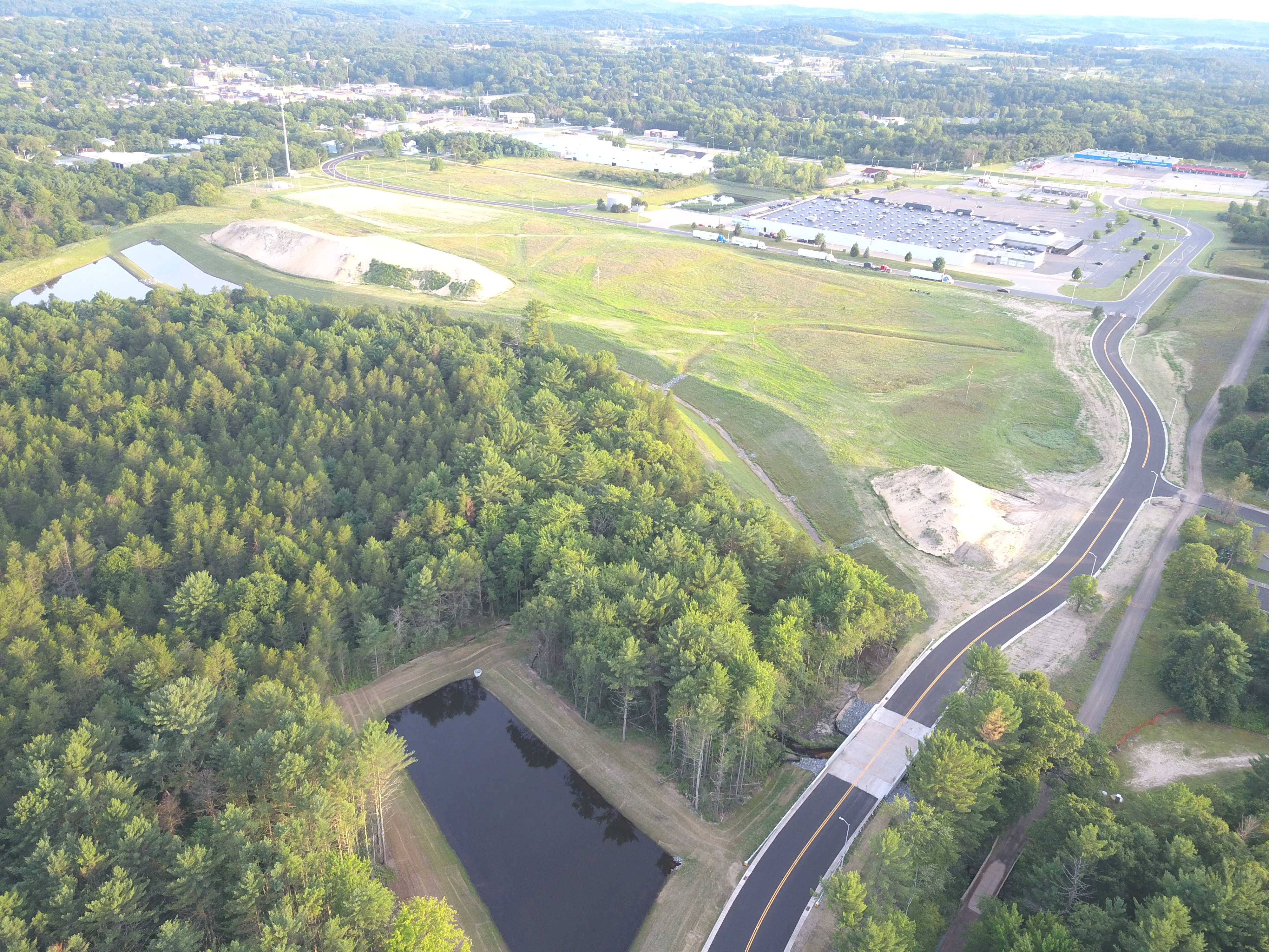 Aerial photo of the City of Black River Falls business park development area after roads, bridges and settlement ponds have been