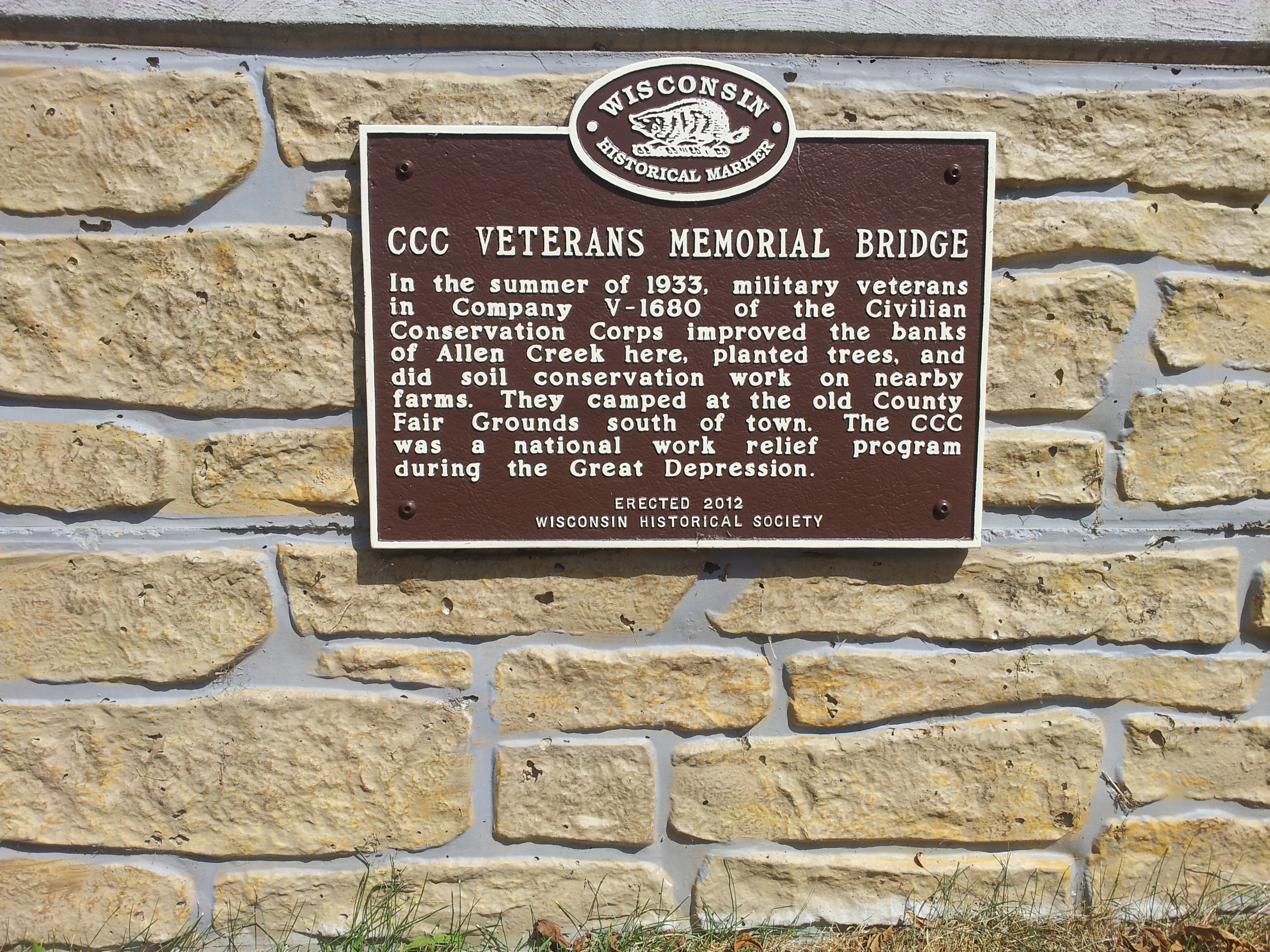 CCC plaque on the Veterans Memorial bridge in the City of Evansville.  "In the summer of 1933 military veterans in Company V-168