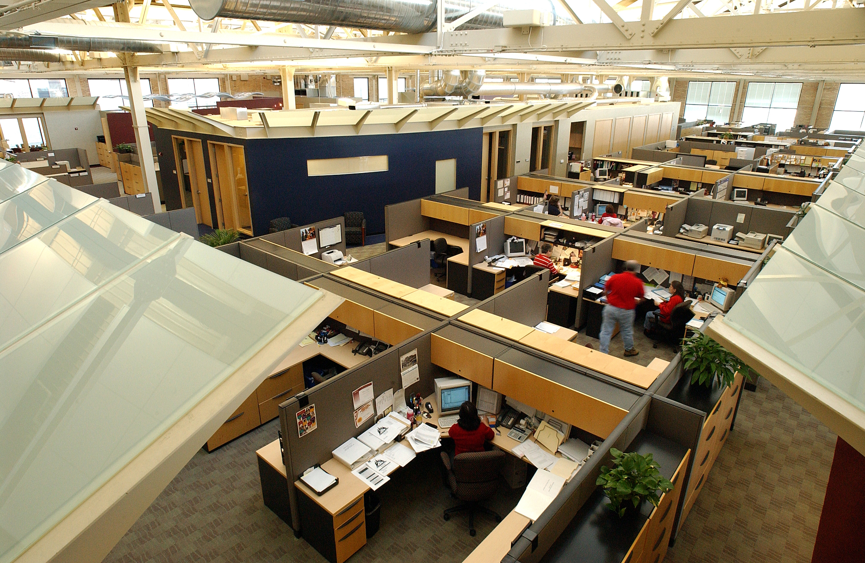 2nd story view looking down on the office cubicles inside the 4 story Summit Place business center in the City of West Allis