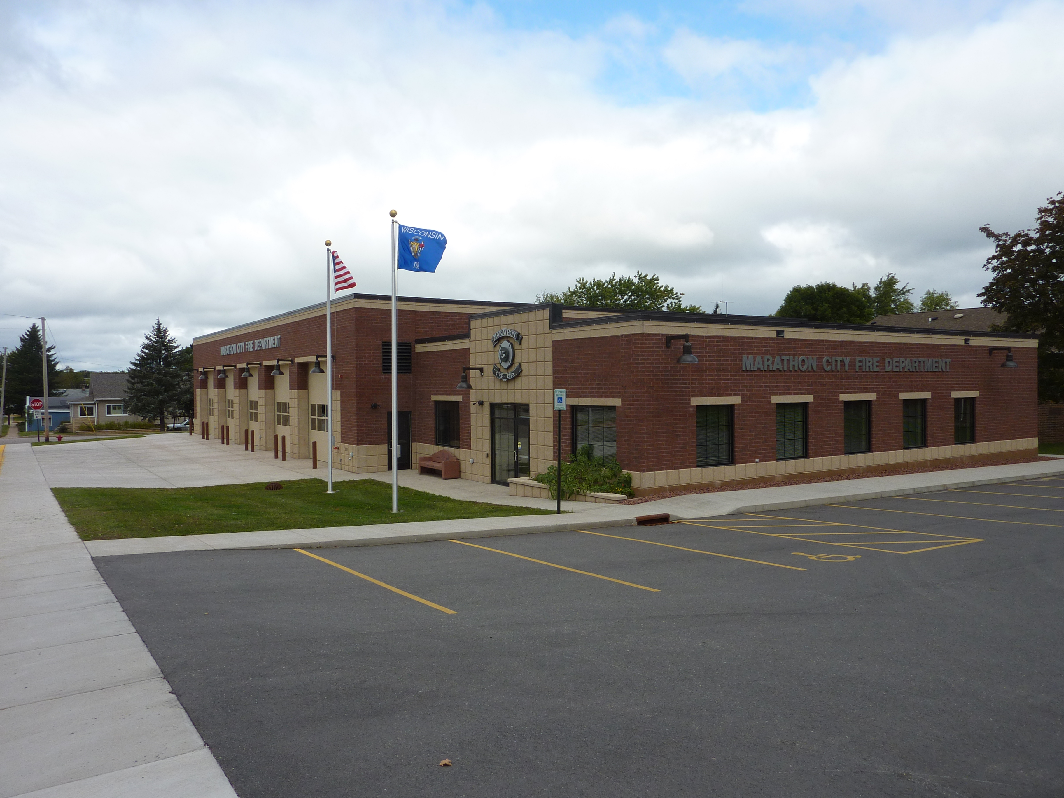 Side view of the red brick Marathon City fire department building